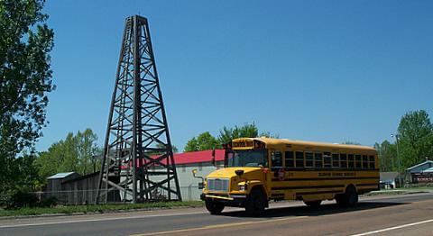 Kansas oil museum derrick and school bus/