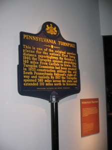 Roadside sign commemorating Pennsylvania's 160-mile turnpike opened in 1940. 