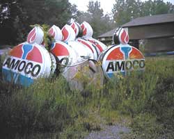 Discarded AMOCO gas station signs.