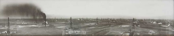 Wild Mary Sudik oil gusher seen amid other Oklahoma City derricks  in a 1930 panorama photograph.