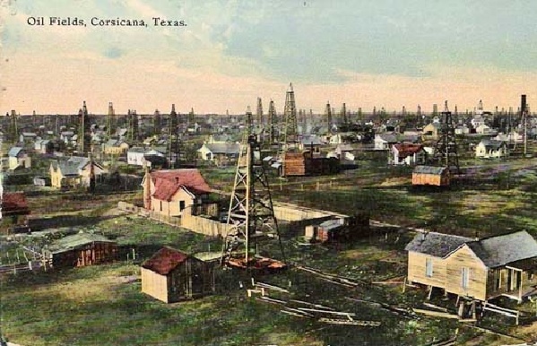 Colorized old postcard of oil wells at Corsicana, Texas.
