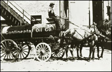 Conocophillips petroleum museum old photo of oil tank wagon.