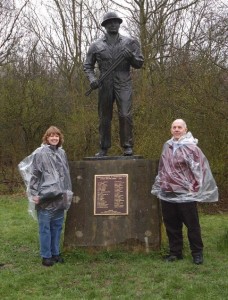 Adam Sieminski and wife Laurie at Oil Patch Warrior statue 
