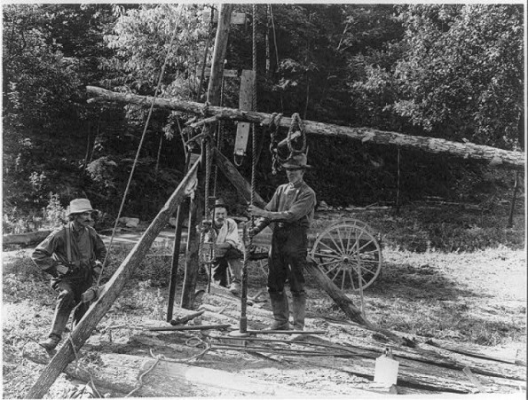 rare image of spring pole drilling well from 1926 film.