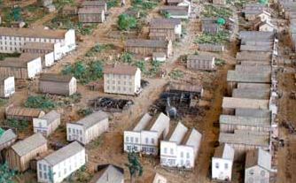 A diorama recreation of Pithole, Pennsylvania, hotels and businesses and muddy streets circa late 1860s.