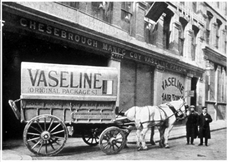 Robert Chesebrough and horse-drawn wagons selling Vaseline in New York City, circa 1900.