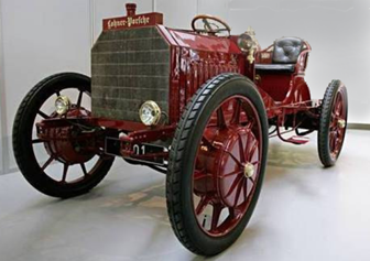 First Hybrid car? Ferdinand Porsche’s 1902 gasoline-electric Mixte auto.