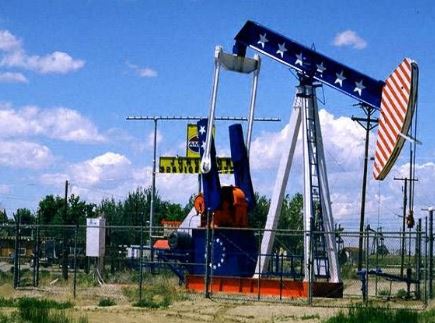 Colorful pumping unit at Wyoming oil well.