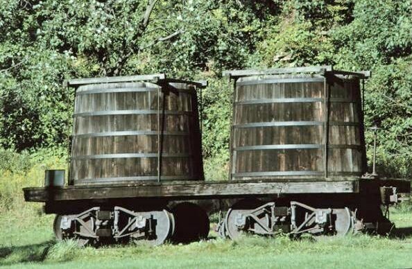 A railroad car with two wooden oil tanks patented by Amos and James Densmore in the 1860s.