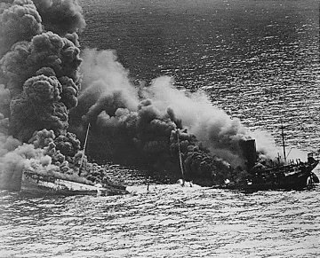 Burning oil tanker during World War II.
