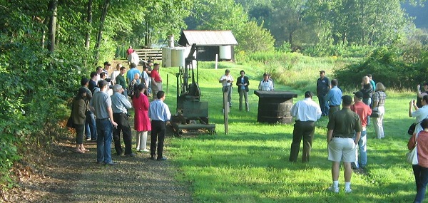 Historians visit the 1861 McClintock well, oldest US producing well.