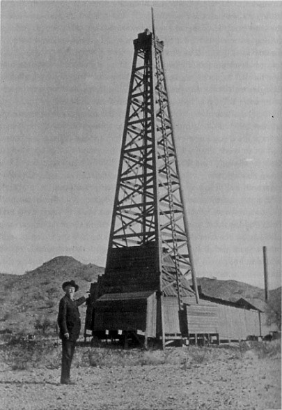 Buffalo Bill stands by his oil company drilling derrick