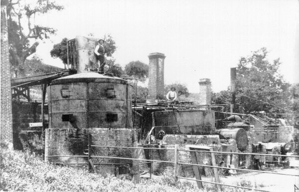 California commercial oil refinery, circa 1880s.