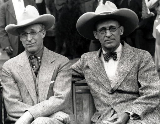 Brothers L.E. Phillips (left) and Frank Phillips in cowboy hats, circa 1920. 