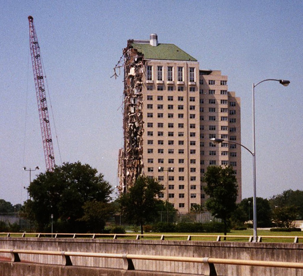 A wrecking ball demolishes the Shamrock Hotel in 1987.