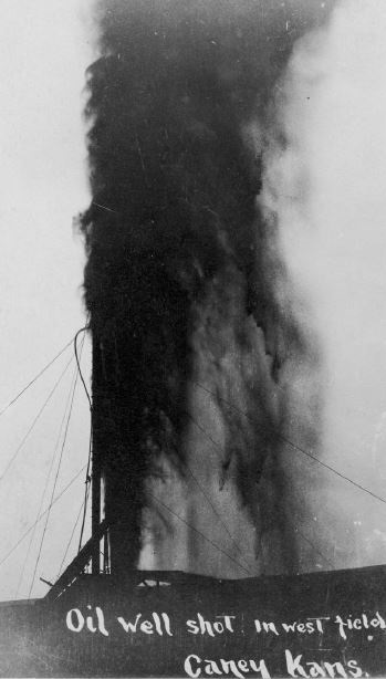 oil well gusher at Caney, Kansas, after nitro shooting.