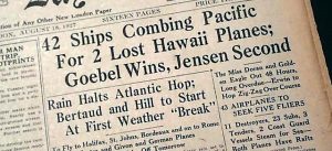 Newspaper headline notes 42 ships looking for lost air race planes.