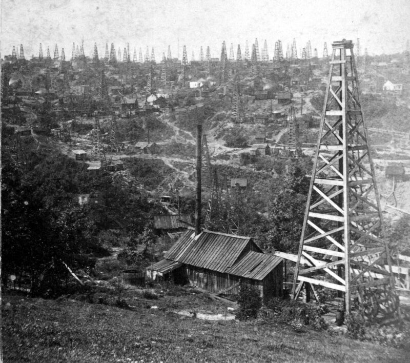 Wooden derricks and engine houses crowd an oilfield at Triumph Hill, Pennsylvania, in the late 1800s.