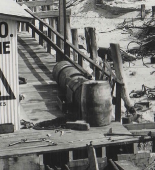 Detail of Puente Oil Company photo with 55-gallon oil drums.