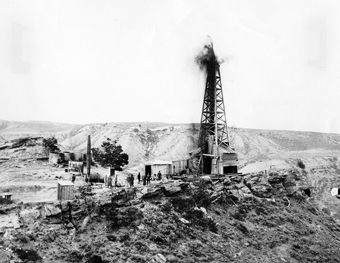 Oil gusher at the Elk Basin Field in Wyoming, circa 1917.