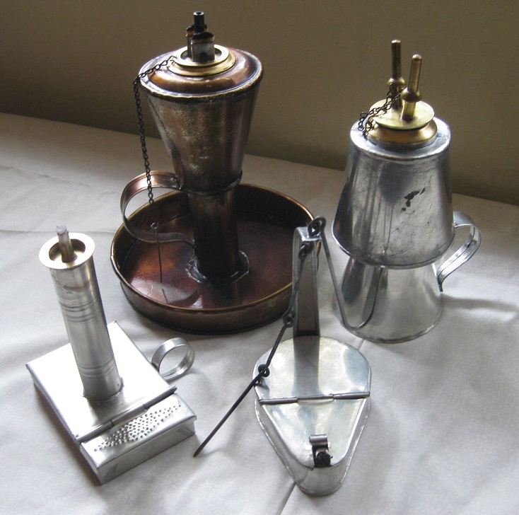 Reproduction camphene, kerosene, and whale oil lamps.