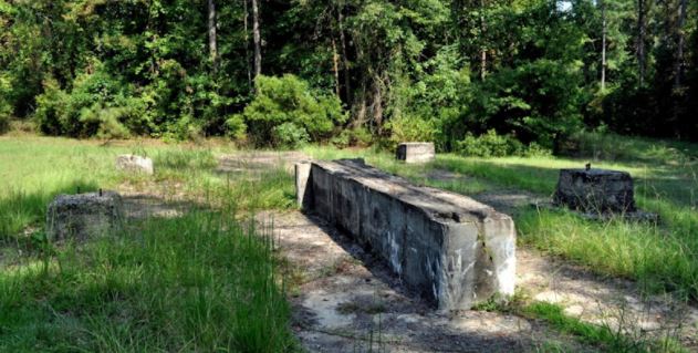 Concrete foundation of Alabama's first oil well, the A.R. Jackson Well No. 1, completed in 1944.