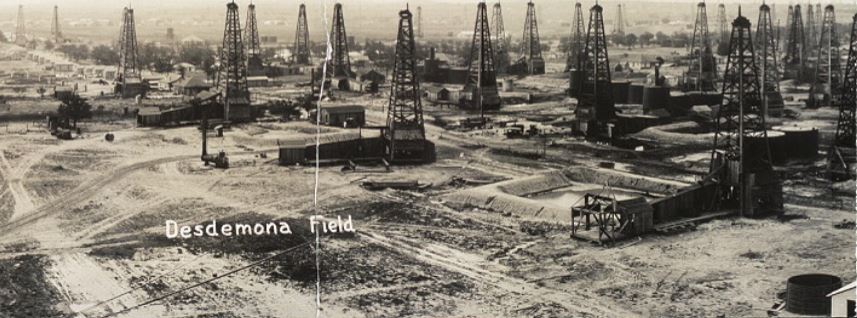 Wooden oil derricks in Desdemona, Texas, oilfield, circa 1919.
