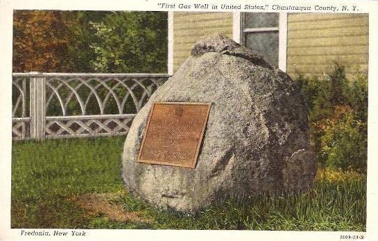 Circa 1950 souvenir postcard of a bronze plaque on a boulder in Fredonia, New York, dedicated in 1925 by the Daughters of the American Revolution to commemorate the "First Gas Well in United States."
