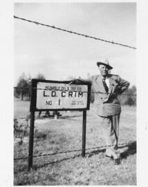 J. Malcolm Crim of Kilgore standing at his wildcat well.