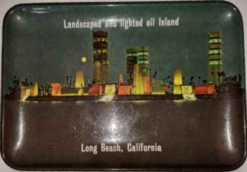 Tray color photo image with illuminated towers and "Landscaped and lighted oil island" text.